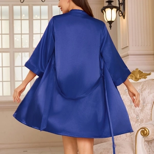 Women's royal blue satin bathrobe with a smooth silky finish and loose fit back view