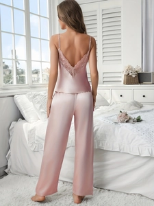Deep V-cut lace detail on the back of pink satin camisole top for women pajamas set