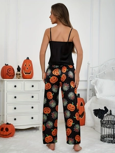 Set pigiama di Halloween con canotta in raso nero e pantaloni con stampa di zucche
