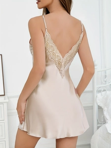 Detailed back view of champagne satin nightgown featuring elegant floral lace V-neck patchwork