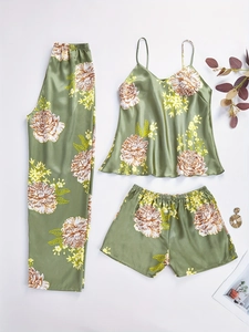 Three-piece green floral ice silk pajama set with camisole, pants, and shorts