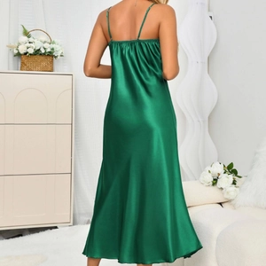 Elegant emerald green satin slip dress with adjustable straps and back pleats
