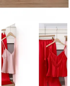 Detailed view of ice silk pajama set with delicate lace trim on red and pink camisoles