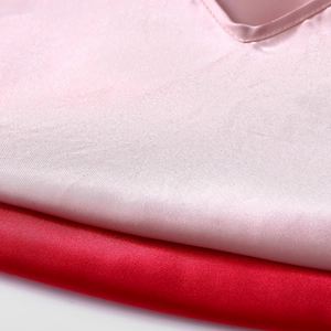 Women's summer ice silk V-neck pajama set in pink and red with soft satin texture