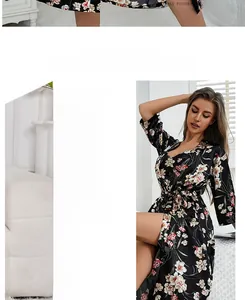 Détail du peignoir en satin à fleurs avec une coupe croisée et une ceinture assortie