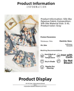 Detail view of grey satin floral pajama set including camisole top and matching trousers