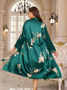 Rear view of luxury dark green satin robe featuring elegant white floral and bird prints