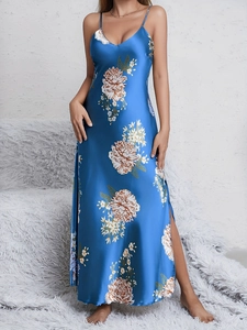 Detail of blue satin floral nightgown featuring V-neckline and elegant side slit