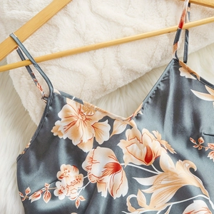 Women's blue floral satin three-piece sleepwear set with camisole and sleek textures