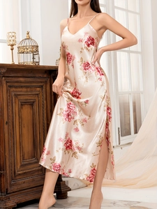 Detailed view of floral satin sleepwear with side slit and delicate lace straps