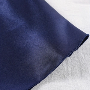 Elegant deep blue satin silk nightgown fabric with smooth glossy finish and fine stitching