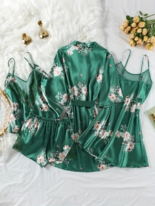 Set pigiama 4 pezzi in raso verde smeraldo con elegante stampa floreale, vista piatta