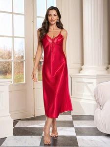 Close-up of red satin nightgown featuring delicate lace V-neckline and silky texture