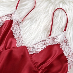 Elegant red satin camisole nightdress with white floral lace trim and spaghetti straps