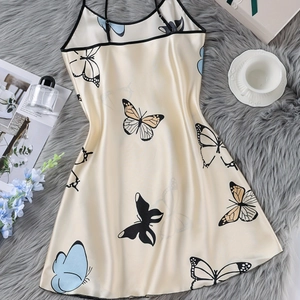 Silky champagne slip nightgown with butterfly prints and elegant black lace trim detail