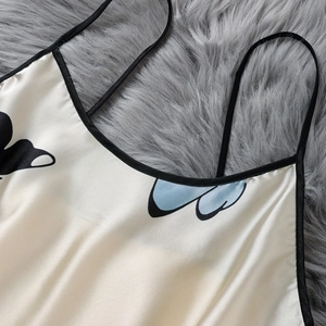 Champagne satin nightgown with blue butterfly print and black lace trim neckline