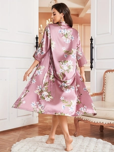 Rear view of floral satin robe in dusty rose with elegant flower patterns and silk shine