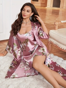 Detailed view of floral satin sleepwear set featuring a slip dress and matching robe