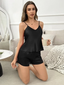 Detail of silk satin camisole set with V-neck top and shorts for luxury loungewear