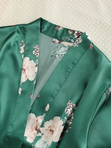 Detail of silk-like satin floral nightgown collar with butterfly print and size M label