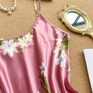 Elegant pink floral silk nightgown with white lily print and delicate thin straps