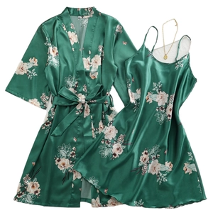 Emerald green satin floral pajama set with robe and slip dress in a high-gloss finish