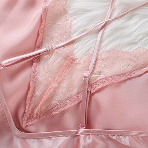 Pink satin three-piece sleepwear set with delicate lace trim and adjustable straps