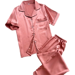 Women's two-piece satin pajama set with short-sleeved top and pants in dusty rose