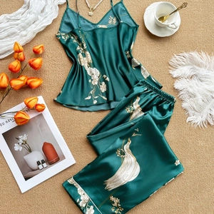 Women's dark green satin pajama set with crane print camisole and long pants