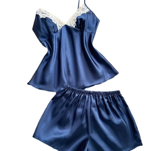 Navy blue silk-satin camisole and shorts pajama set with elegant white lace V-neck trim