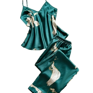 Women's emerald green silk pajama set with floral peacock print in high-shine satin finish
