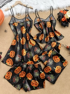 Halloween silk satin pajama set featuring pumpkin and spider web prints for women