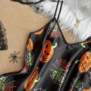 Women's Halloween satin sleepwear set with pumpkin and spider web prints in black