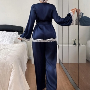 Navy blue satin pajama set with lace trim and matching long pants for women
