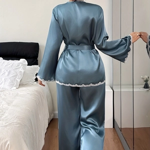 Elegant two-piece silk satin pajama set with lace trim and waist tie in dusty blue