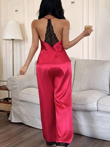 Detailed back view of satin sleepwear set with intricate black lace racerback design