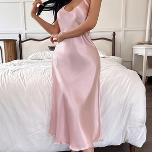 Pink satin slip dress with a V-neck and silky sheen for luxury home loungewear