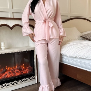 Pink seersucker pajama set with kimono wrap top, belted waist and delicate ruffled cuffs