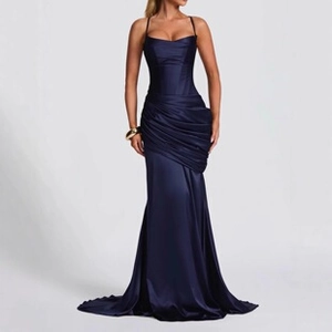 Detail of elegant dark blue satin evening gown with pleated waist and mermaid tail design