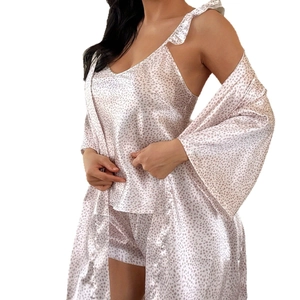 Three-piece women's satin pajama set with camisole, shorts and robe in dot print