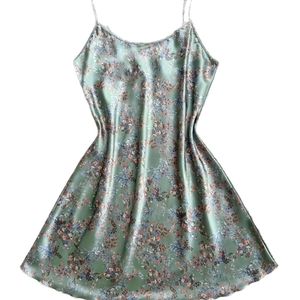 Sage green floral satin slip dress with thin straps and a silky smooth A-line silhouette