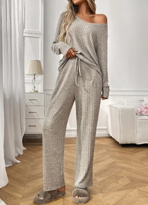 Detail of ribbed knit loungewear set featuring V-neck long sleeve top and wide-leg pants