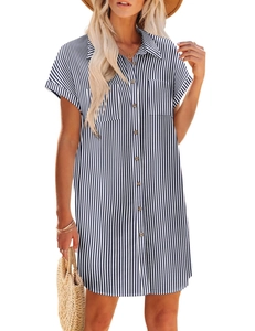 Detail of blue striped cotton linen dress showing wooden buttons and chest pockets