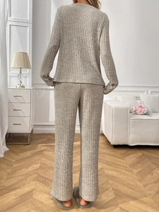 Detail of grey ribbed knit texture and loose fit design of long sleeve loungewear set
