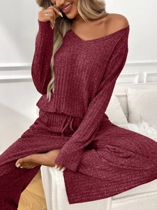 Detailed view of the rib-knit texture and fabric quality on burgundy loungewear set