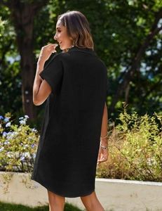 Detail of the black cotton linen short sleeve dress with natural texture and relaxed fit