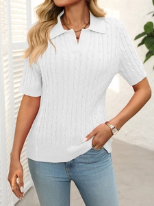 Detail of white cable knit short sleeve polo sweater with V-neck collar for women