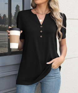 Detail of a black Henley neck T-shirt featuring three wooden buttons and puff sleeves