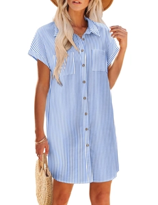 Detail view of blue striped cotton dress with wooden buttons and front chest pockets