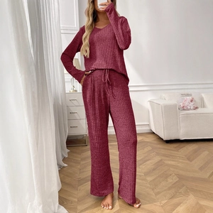 Women's burgundy ribbed loungewear set with long sleeve crewneck top and wide leg pants